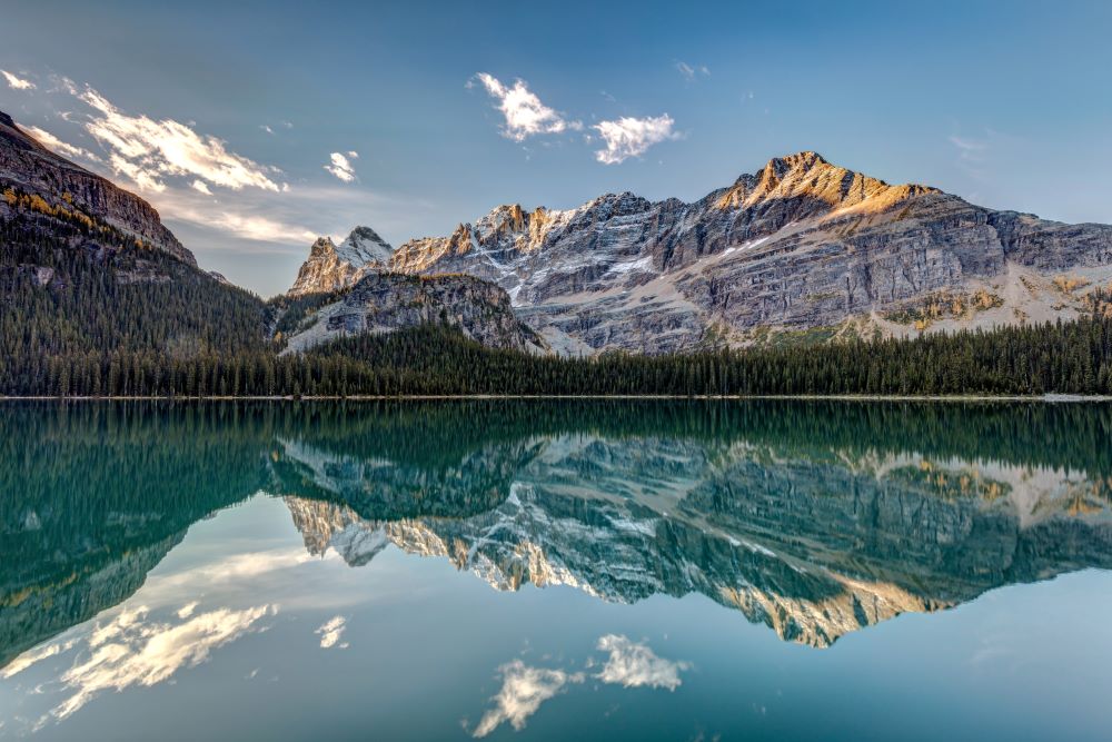 A mountain reflected on a clear lake
